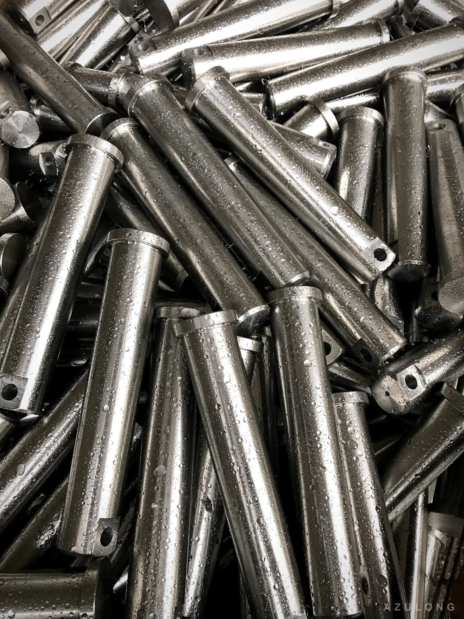 Freshly machined pins straight from the production line